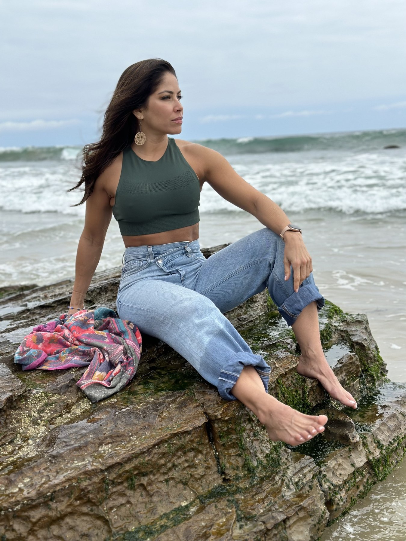 Valery seated beside the ocean