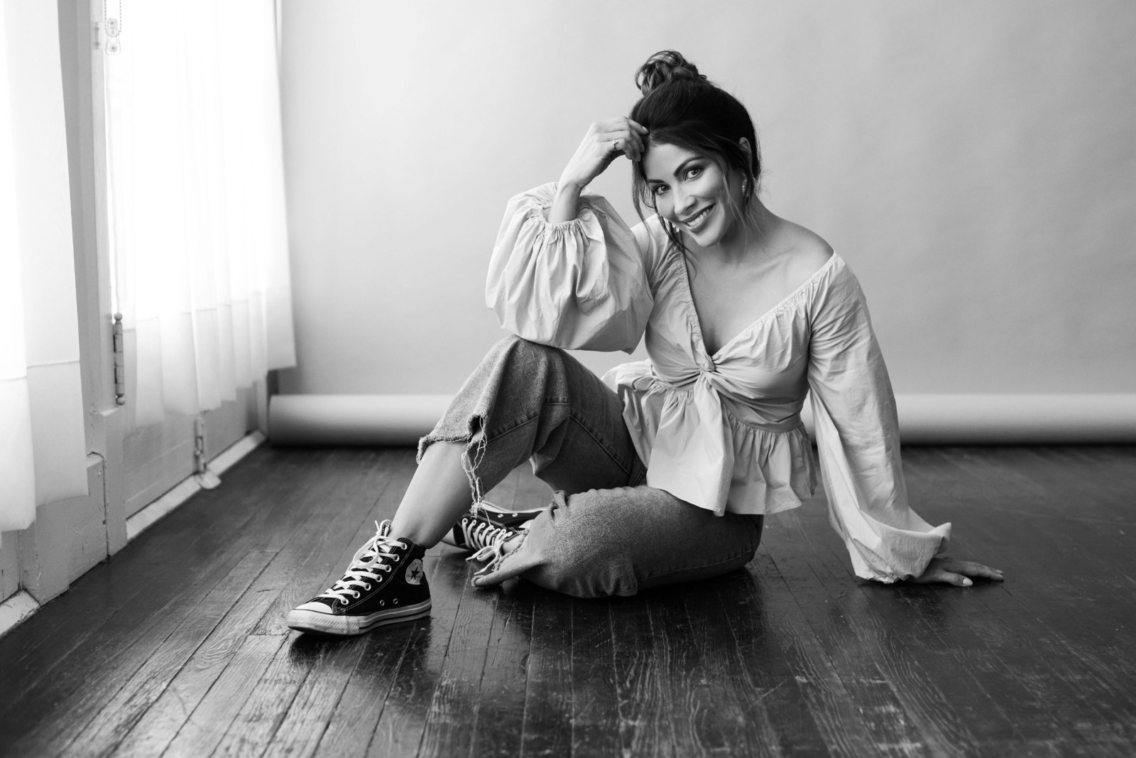 Valery in a black and white studio portrait