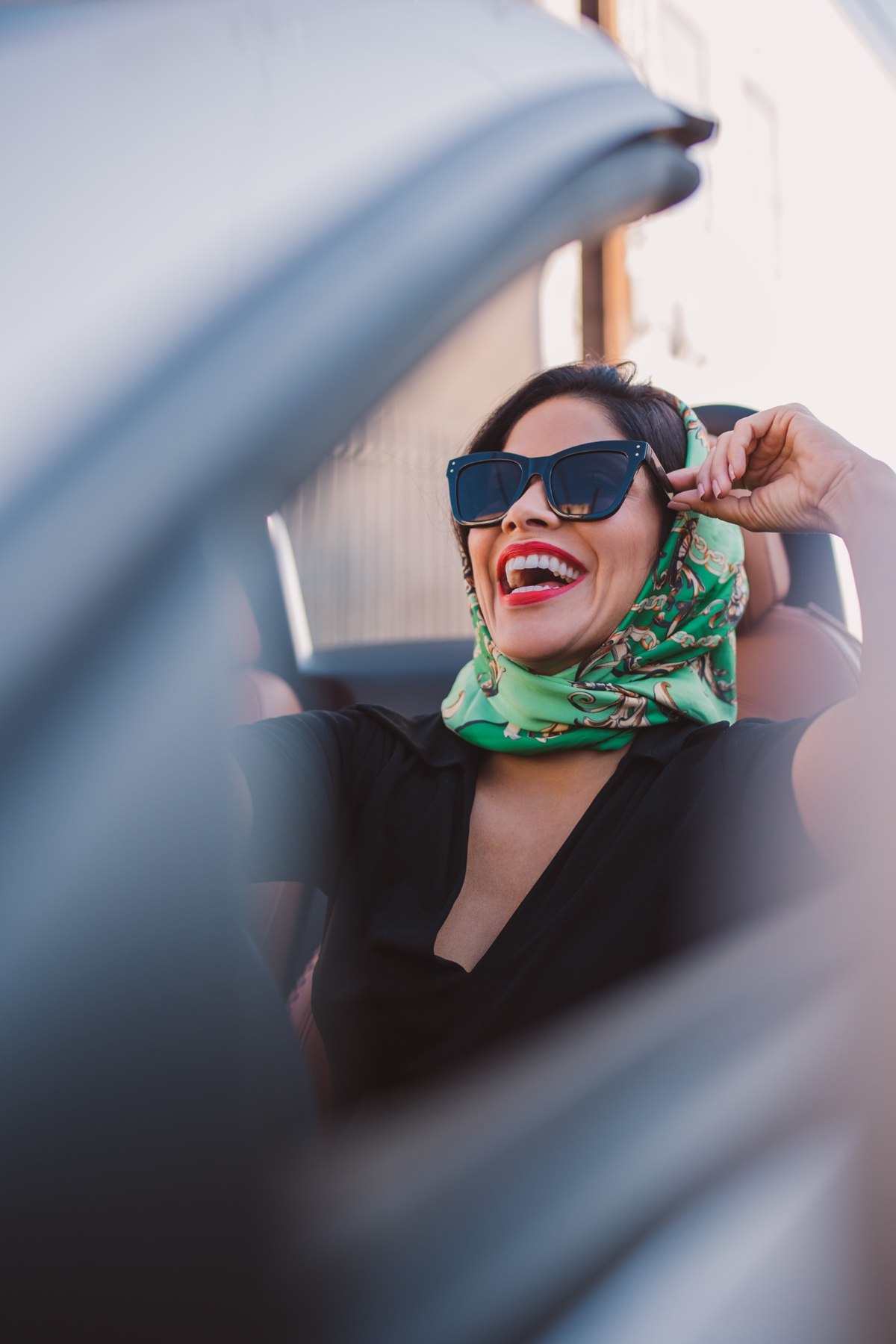 Valery wearing sunglasses in an editorial portrait